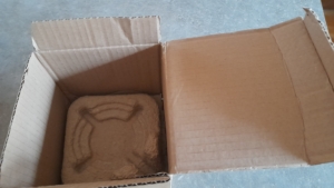 Calage de la partie inférieure du mug par un carton préformé